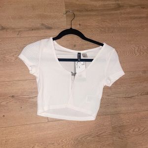 H & M top size small (never worn)